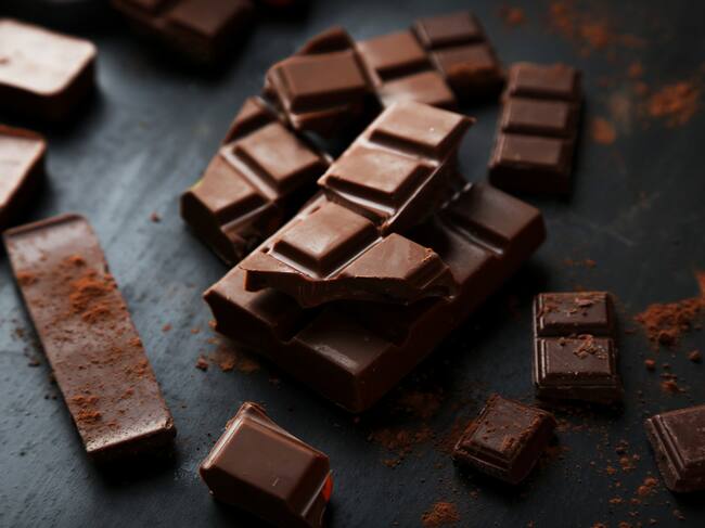 Chocolate plates on black background