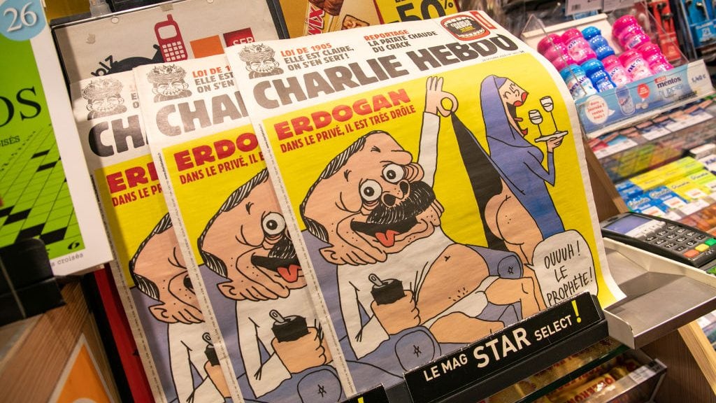 PARIS, FRANCE - OCTOBER 28: French satirical weekly Charlie Hebdo's edition displaying a cover with a satirical drawing representing Turkish President Tayyip Erdogan is displayed for sale on October 28, 2020 in Paris, France. Turkey says it will take legal measures against Charlie Hebdo magazine in Paris after publication of a caricature of Turkish President Erdogan. (Photo by Marc Piasecki/Getty Images)