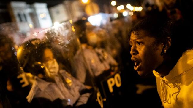 PHILADELPHIA, PA - OCTOBER 27: A demonstrator screams at a police line during a protest near the location where Walter Wallace, Jr. was killed by two police officers on October 27, 2020 in Philadelphia, Pennsylvania. Protests erupted after the fatal shooting of 27-year-old Wallace Jr, who Philadelphia police officers claimed was armed with a knife. (Photo by Mark Makela/Getty Images)
