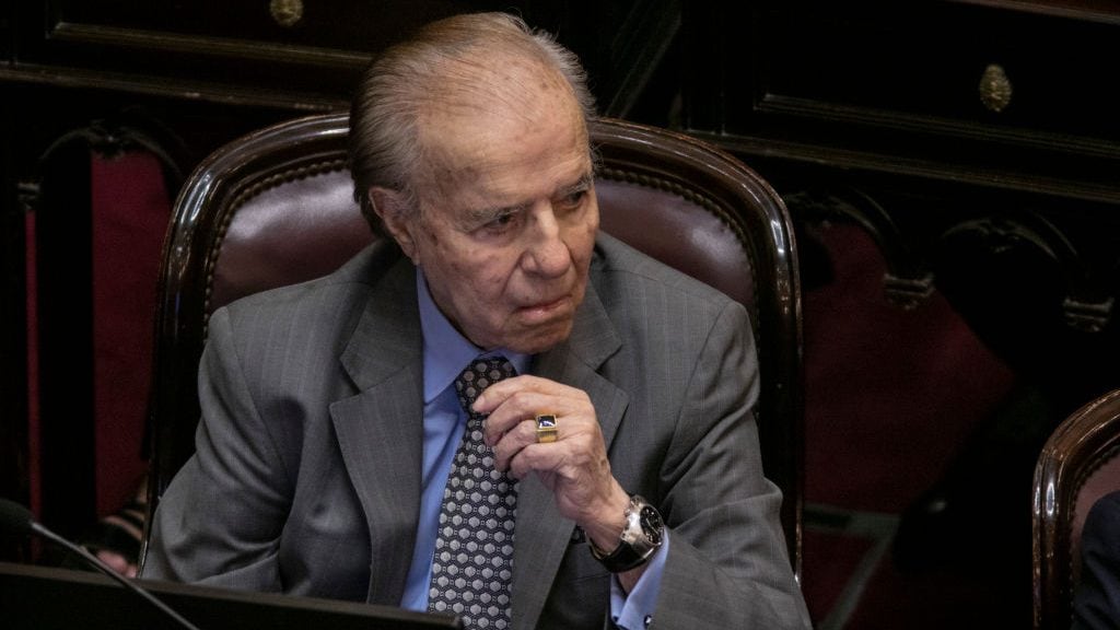 BUENOS AIRES, ARGENTINA - DECEMBER 20: Argentine Senator and former President (1989-1999) Carlos Saul Menem attends the session during the debate of the Economy Emergency Law at National Congress of Argentina on December 20, 2019 in Buenos Aires, Argentina. Lawmakers in the Chamber of Deputies have voted this morning, after a debate that lasted over 14 hours, to approve the economic emergency legislative project of President Alberto Fernández. (Photo by Ricardo Ceppi/Getty Images)