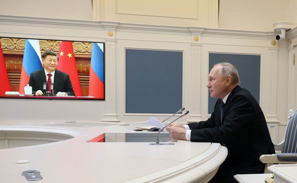 Presidente ruso Vladimir Putin en reunión con el presidente chino Xi Jinping