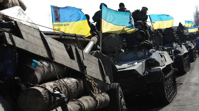 SOLEDAR, UKRAINE - FEBRUARY 27: The Ukrainian Army withdraws 15, 100 mm caliber artillery guns in Soledar, eastern Ukraine, on February 27, 2015. In accordance with a February 12 ceasefire brokered by the leaders of Ukraine, Russia, Germany and France, Ukrainian forces and Russia-backed separatists agreed to stop fighting and withdraw heavy weapons from the frontlines of a conflict that has killed over 5,000 people in the past year. (Photo by Scott Peterson/Getty Images)