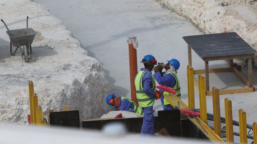Foreign laborers work at the construction site of the al-Wakrah football stadium, one of the Qatar's 2022 World Cup stadiums, on May 4, 2015, in Doha's Al-Wakrah southern suburbs. AFP PHOTO / MARWAN NAAMANI (Photo by MARWAN NAAMANI / AFP)        (Photo credit should read MARWAN NAAMANI/AFP via Getty Images)