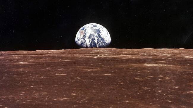 376713 11: (FILE PHOTO) A view of the Earth appears over the Lunar horizon as the Apollo 11 Command Module comes into view of the Moon before Astronatus Neil Armstrong and Edwin Aldrin Jr. leave in the Lunar Module, Eagle, to become the first men to walk on the Moon's surface. The 30th anniversary of the Apollo 11 Moon mission is celebrated July 20, 1999. (Photo by NASA/Newsmakers)