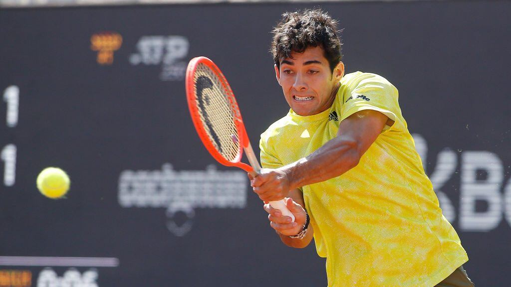 SANTIAGO, CHILE - MARCH 14: Cristian Garin of Chile plays a backhand against Facundo Bagnis of Argentina during the final of Chile Dove Men+Care Open at Club Deportivo Universidad Catolica on March 14, 2021 in Santiago, Chile. (Photo by Marcelo Hernandez/Getty Images)