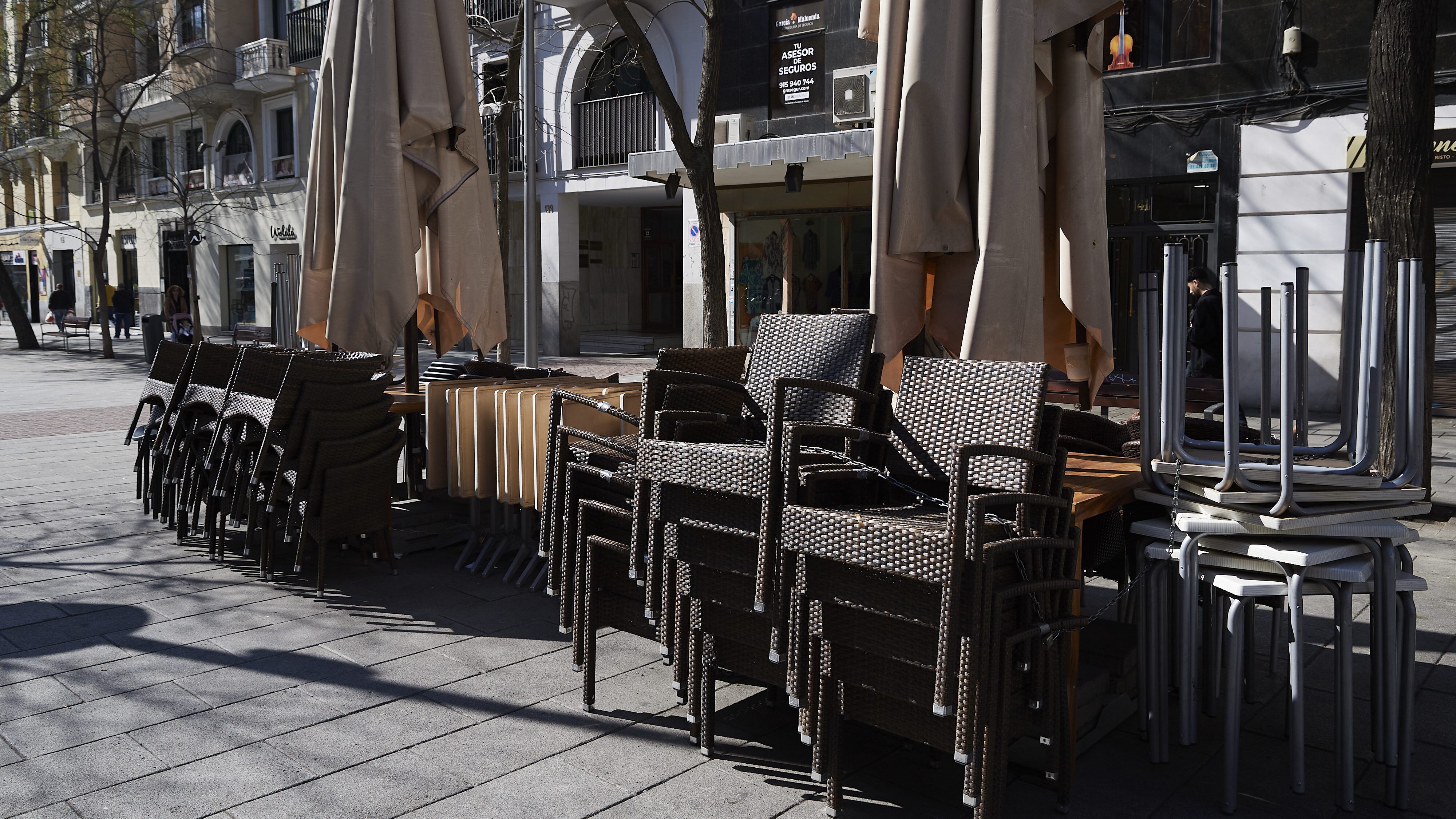 MADRID, SPAIN - MARCH 13: Tables and chairs at Fuencarral street terraces after Madrid's Mayor announced that he would order the closure of terraces in the Spanish capital, and recommends the bars and restaurants to close due to the coronavirus crisis on March 13, 2020 in Madrid, Spain. Today known cases of Covid-19 in Madrid are 2.000, this is about half the total across the country. Spain is now the second hardest hit European country next to Italy with 90 reported deaths, 56 in Madrid. (Photo by Carlos Alvarez/Getty Images)