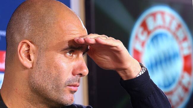 MUNICH, GERMANY - NOVEMBER 23: Josep Guardiola, head coach of Bayern Muenchen looks on during a FC Bayern Muenchen press conference, on the eve of their UEFA Champions League match against Olympiacos FC, at Bayern`s training ground Saebener Strasse on November 23, 2015 in Munich, Germany. (Photo by Alexander Hassenstein/Bongarts/Getty Images)