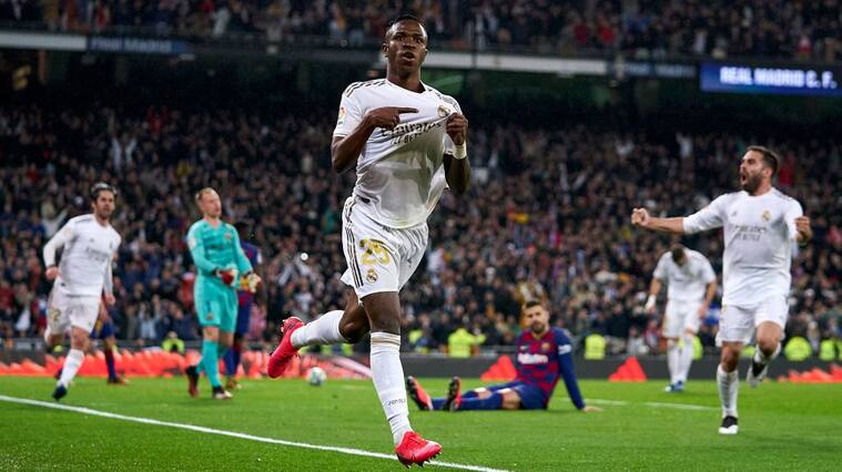 MADRID, SPAIN - MARCH 01: Vinicius Jr of Real MAdrid CF celebrates after scoring his team's first goal during the Liga match between Real Madrid CF and FC Barcelona at Estadio Santiago Bernabeu on March 01, 2020 in Madrid, Spain. (Photo by Diego Souto/Quality Sport Images/Getty Images)