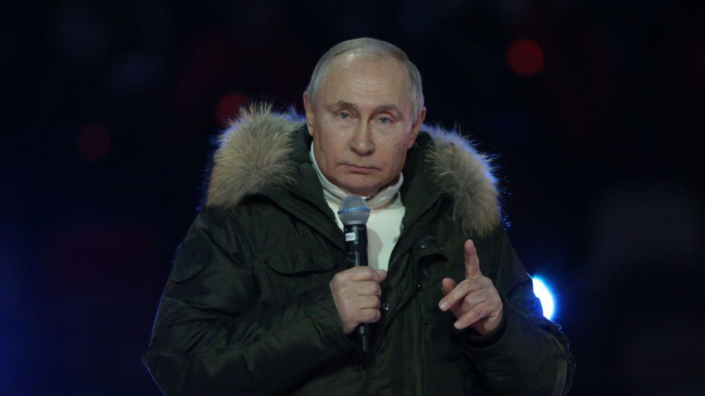 MOSCOW, RUSSIA - MARCH 18: (RUSSIA OUT) Russian President Vladimir Putin speaks during a concert marking the 7th anniversary of Crimea annexation, on March 18, 2021in Moscow, Russia. Tens thousands of people gathered at Luzhniki Stadium to watch a patriotic concert called "The days of Crimea". (Photo by Mikhail Svetlov/Getty Images)