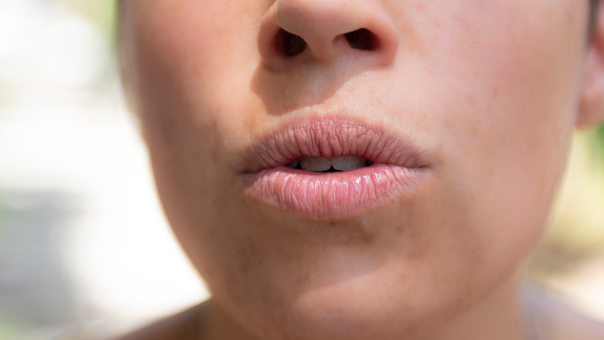 Close up to a woman mouth showing expressions