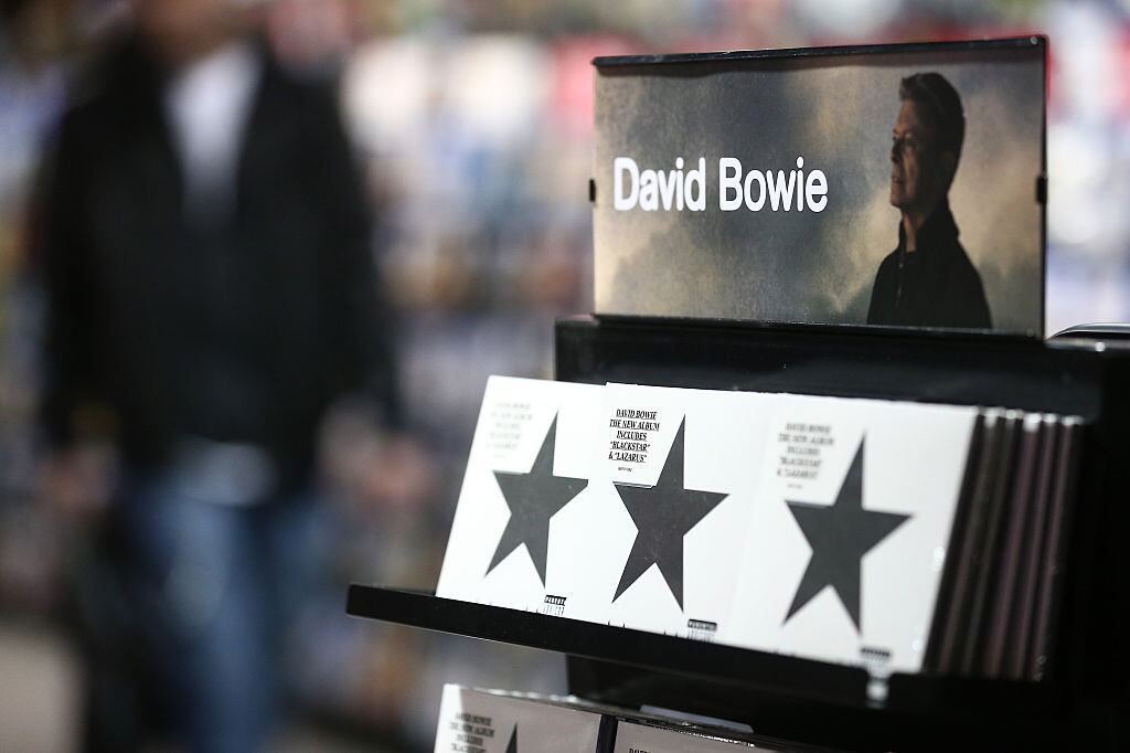 Copies of "Blackstar" the latest album by British musician David Bowie are on sale in a branch of HMV in central London on January 11, 2016. British music legend David Bowie has died at the age of 69 after a secret battle with cancer, drawing an outpouring of tributes for one of the most influential and innovative artists of his time.AFP PHOTO / JUSTIN TALLIS / AFP / JUSTIN TALLIS (Photo credit should read JUSTIN TALLIS/AFP via Getty Images)