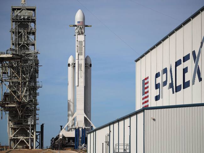 CAPE CANAVERAL, FL - FEBRUARY 05: The SpaceX Falcon Heavy rocket sits on launch pad 39A at Kennedy Space Center as it is prepared for tomorrow's lift-off on February 5, 2018 in Cape Canaveral, Florida. The rocket, which is the most powerful rocket in the world, is scheduled to make its maiden flight between 1:30 and 4:30 p.m. tomorrow. (Photo by Joe Raedle/Getty Images)