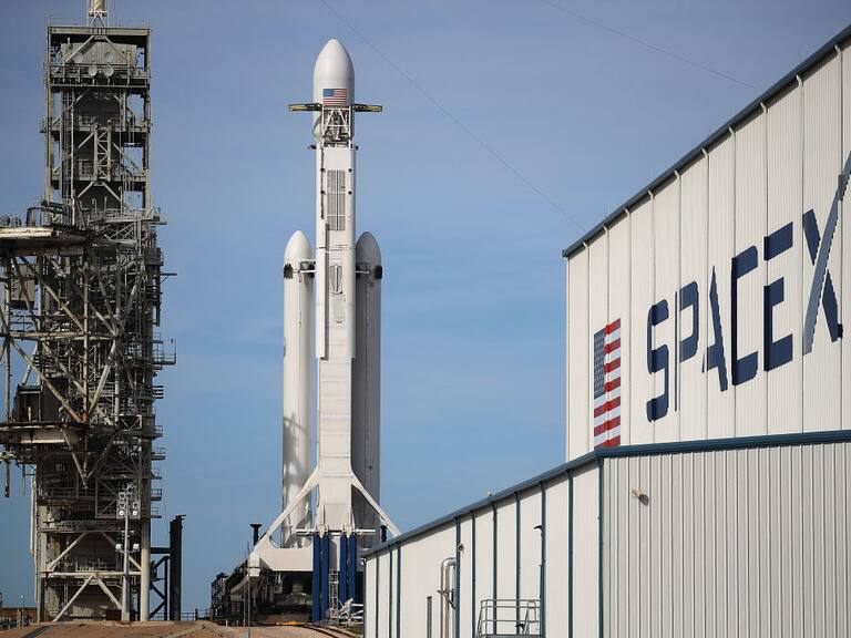 CAPE CANAVERAL, FL - FEBRUARY 05:  The SpaceX Falcon Heavy rocket sits on launch pad 39A at Kennedy Space Center as it is prepared for tomorrow&#039;s lift-off  on February 5, 2018 in Cape Canaveral, Florida. The rocket, which is the most powerful rocket in the world, is scheduled to make its maiden flight between 1:30 and 4:30 p.m. tomorrow.  (Photo by Joe Raedle/Getty Images)
