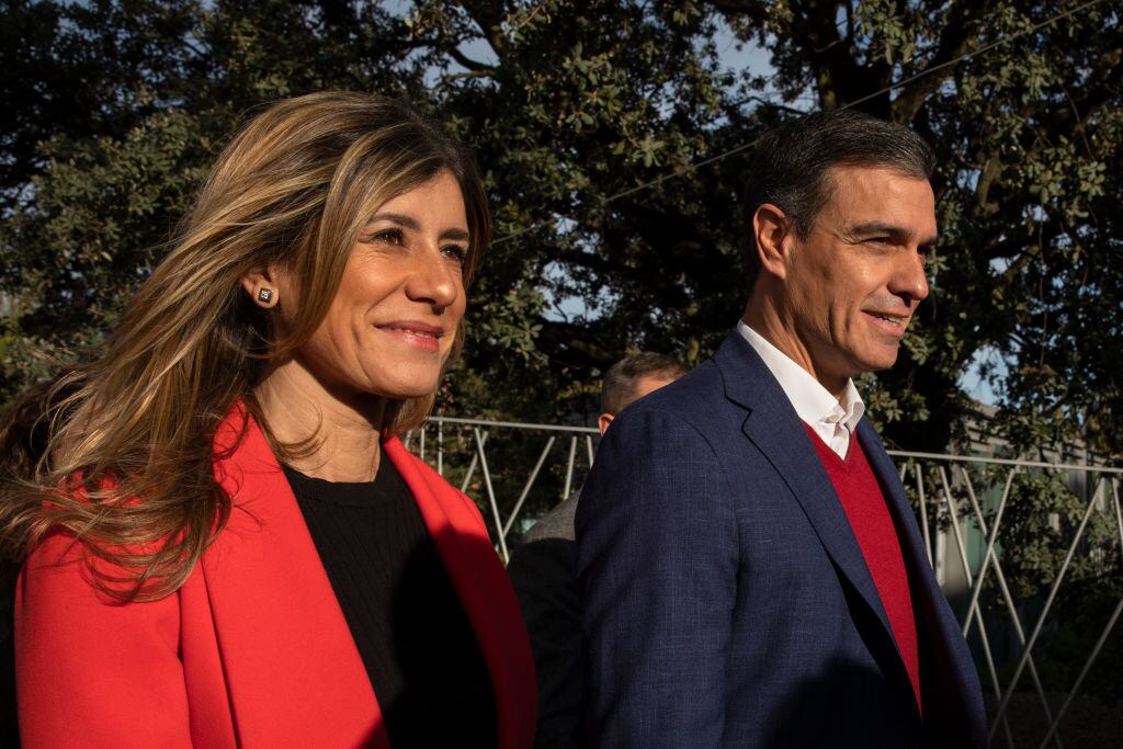 POZUELO DE ALARCON, SPAIN - NOVEMBER 10: Pedro Sanchez, Leader of the Socialist Party (PSOE) and Prime Minister of Spain (R) and his wife Maria Begona Gomez (L) leave after casting his vote on November 10, 2019 in Pozuelo de Alarcon, in Madrid province, Spain. Spain holds its fourth general election in four years on Sunday 10th November in the hope of breaking a prolonged political deadlock. After the last election, the Socialist Party (PSOE) Leader, Pedro Sánchez, was unable to secure enough parliamentary support to form a government. Other parties on the ballot are left-leaning Podemos, splinter party Más País, the conservative Popular Party, centre-right Ciudadanos and the far-right Vox. (Photo by Pablo Blazquez Dominguez/Getty Images)