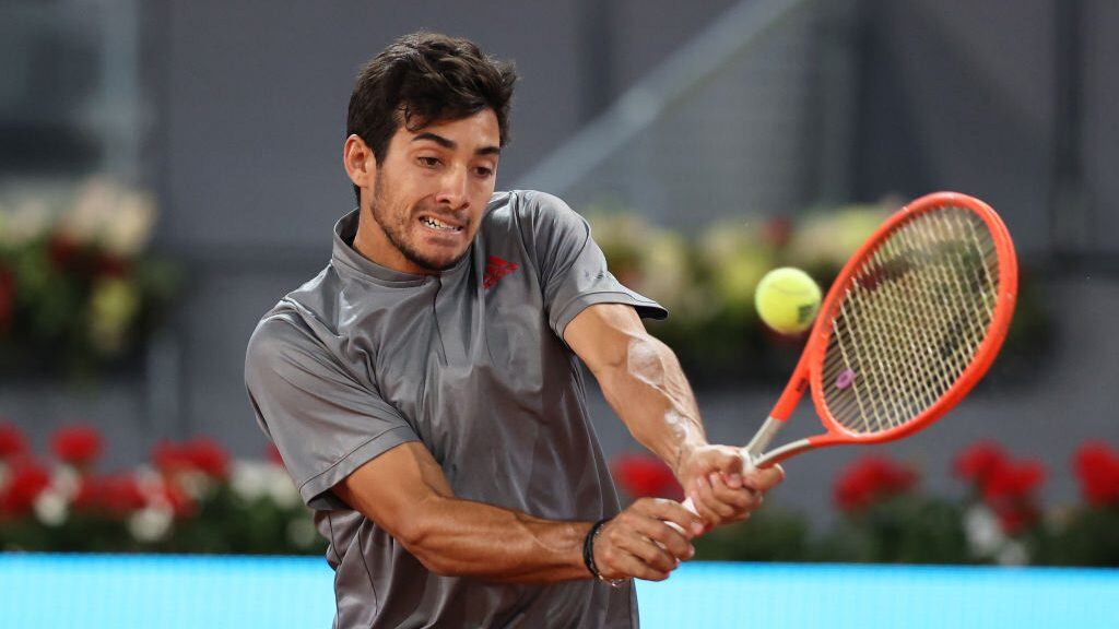 MADRID, SPAIN - MAY 07: Cristian Garín of Chile plays a backhand shot during their Quarter Final match against Matteo Berrettini of Italy during Day Nine of the Mutua Madrid Open at La Caja Magica on May 07, 2021 in Madrid, Spain. (Photo by Clive Brunskill/Getty Images)