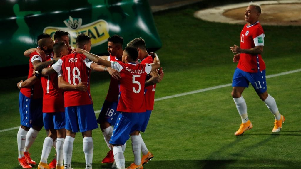 SANTIAGO, CHILE - OCTOBER 13: Alexis Sánchez of Chile celebrates after scoring the second goal of his team with teammates during a match between Chile and Colombia as part of South American Qualifiers for Qatar 2022 at Estadio Nacional de Chile on October 13, 2020 in Santiago, Chile. (Photo by Alberto Valdes-Pool/Getty Images)