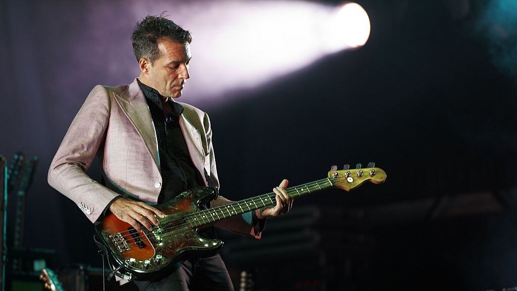 LEEDS, UNITED KINGDOM - AUGUST 28: Steve Mackey of Pulp performs on stage during day three of Leeds Festival at Bramham Park on August 28, 2011 in Leeds, United Kingdom. (Photo by Gary Wolstenholme/Redferns)