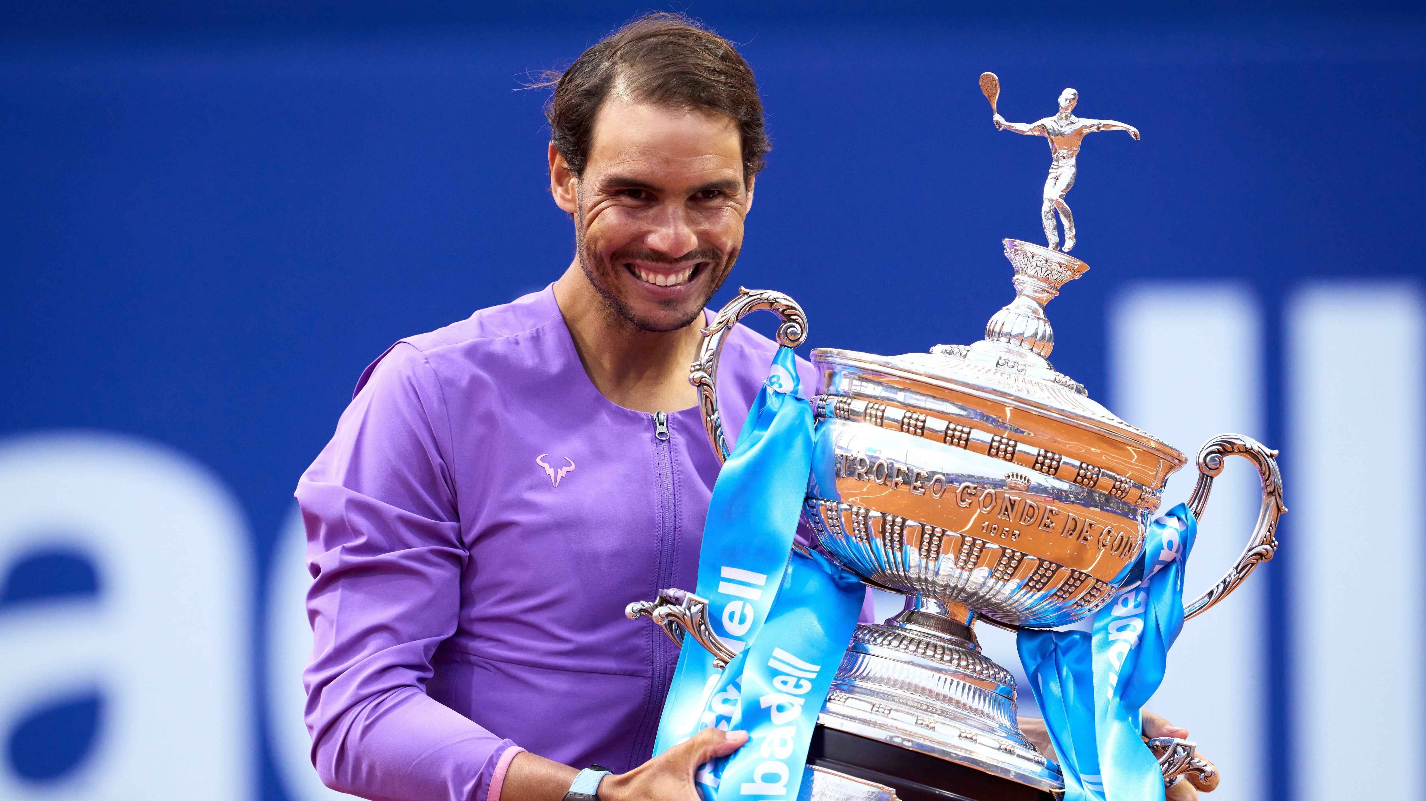 BARCELONA, SPAIN - APRIL 25: Rafael Nadal of Spain poses with the trophy after his victory against Stefanos Tsitsipas of Greece in their final match during day seven of the Barcelona Open Banc Sabadell 2021 at Real Club de Tenis Barcelona on April 25, 2021 in Barcelona, Spain. (Photo by Alex Caparros/Getty Images)