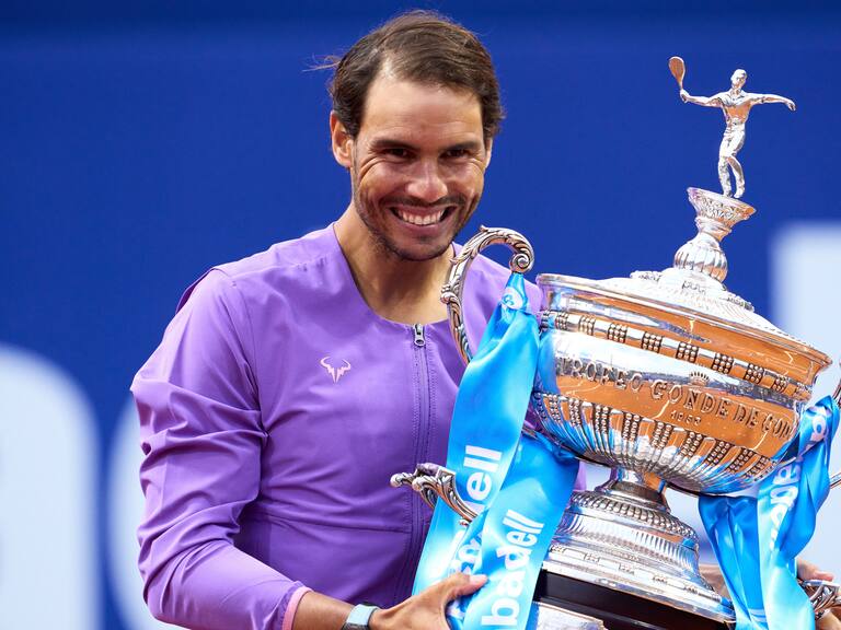 BARCELONA, SPAIN - APRIL 25: Rafael Nadal of Spain poses with the trophy after his victory against Stefanos Tsitsipas of Greece in their final match during day seven of the Barcelona Open Banc Sabadell 2021 at Real Club de Tenis Barcelona on April 25, 2021 in Barcelona, Spain. (Photo by Alex Caparros/Getty Images)