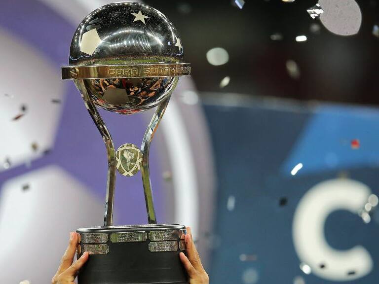 Brazil's Atletico Paranaense's players celebrate with the trophy after winning over Colombia's Junior during the 2018 Copa Sudamericana second leg final football match at the Arena da Baixada stadium in Curitiba, Brazil, on December 12, 2018. (Photo by Heuler Andrey / AFP) (Photo credit should read HEULER ANDREY/AFP via Getty Images)