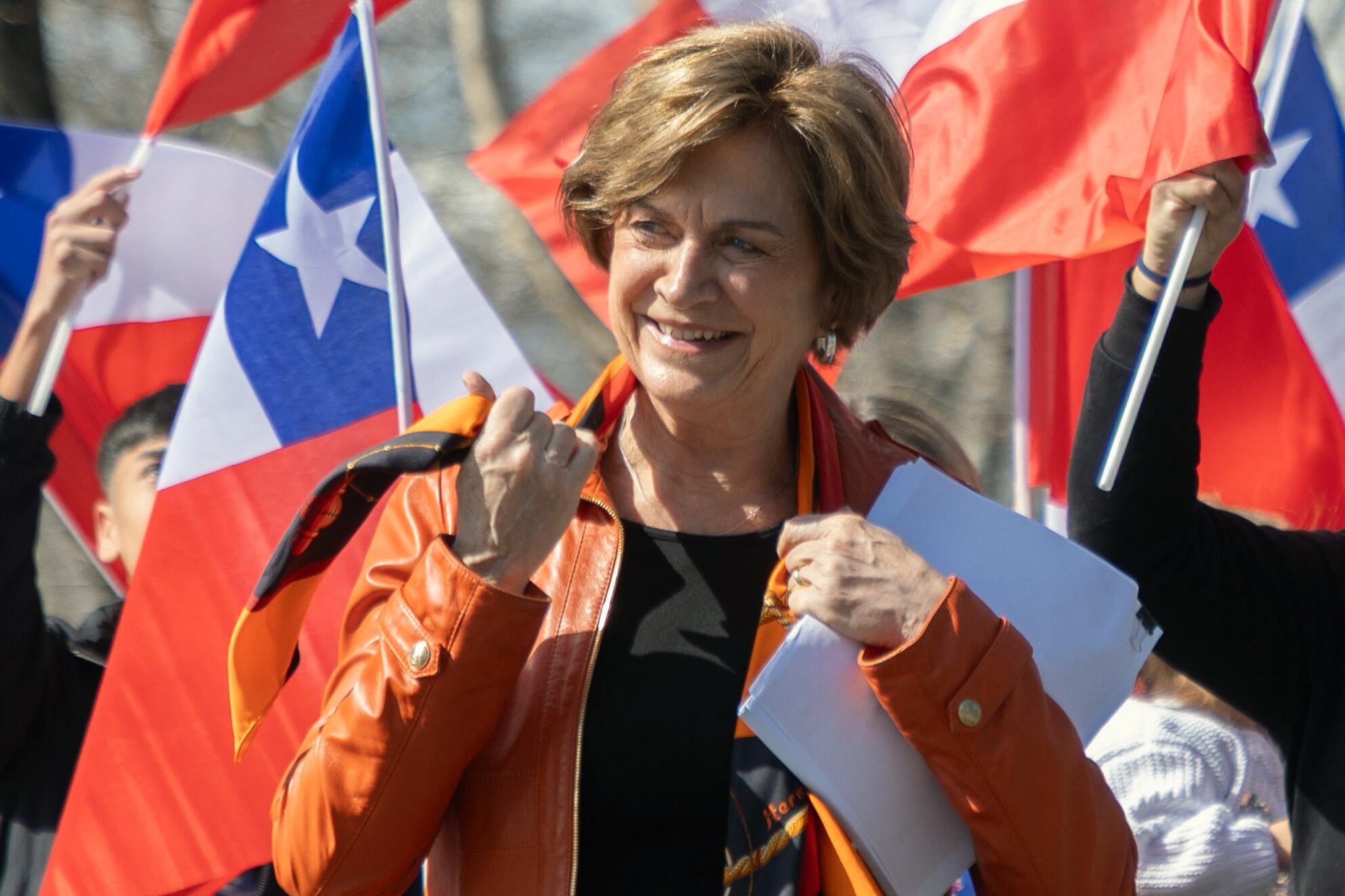 Chile's presidential candidate Evelyn Matthei walks with supporters after registering her candidacy at the Servel offices in Santiago on August 16, 2025. (Photo by Raul BRAVO / AFP) (Photo by RAUL BRAVO/AFP via Getty Images)