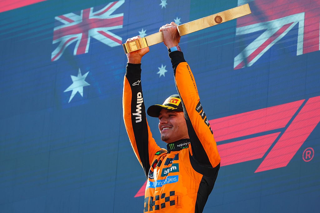 SPIELBERG, AUSTRIA - JUNE 29: Lando Norris of Great Britain and McLaren raises his trophy on the podium during the F1 Grand Prix of Austria at Red Bull Ring on June 29, 2025 in Spielberg, Austria. (Photo by Kym Illman/Getty Images)