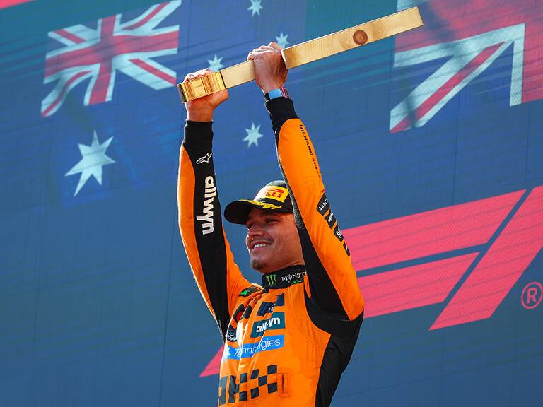 SPIELBERG, AUSTRIA - JUNE 29: Lando Norris of Great Britain and McLaren raises his trophy on the podium during the F1 Grand Prix of Austria at Red Bull Ring on June 29, 2025 in Spielberg, Austria. (Photo by Kym Illman/Getty Images)