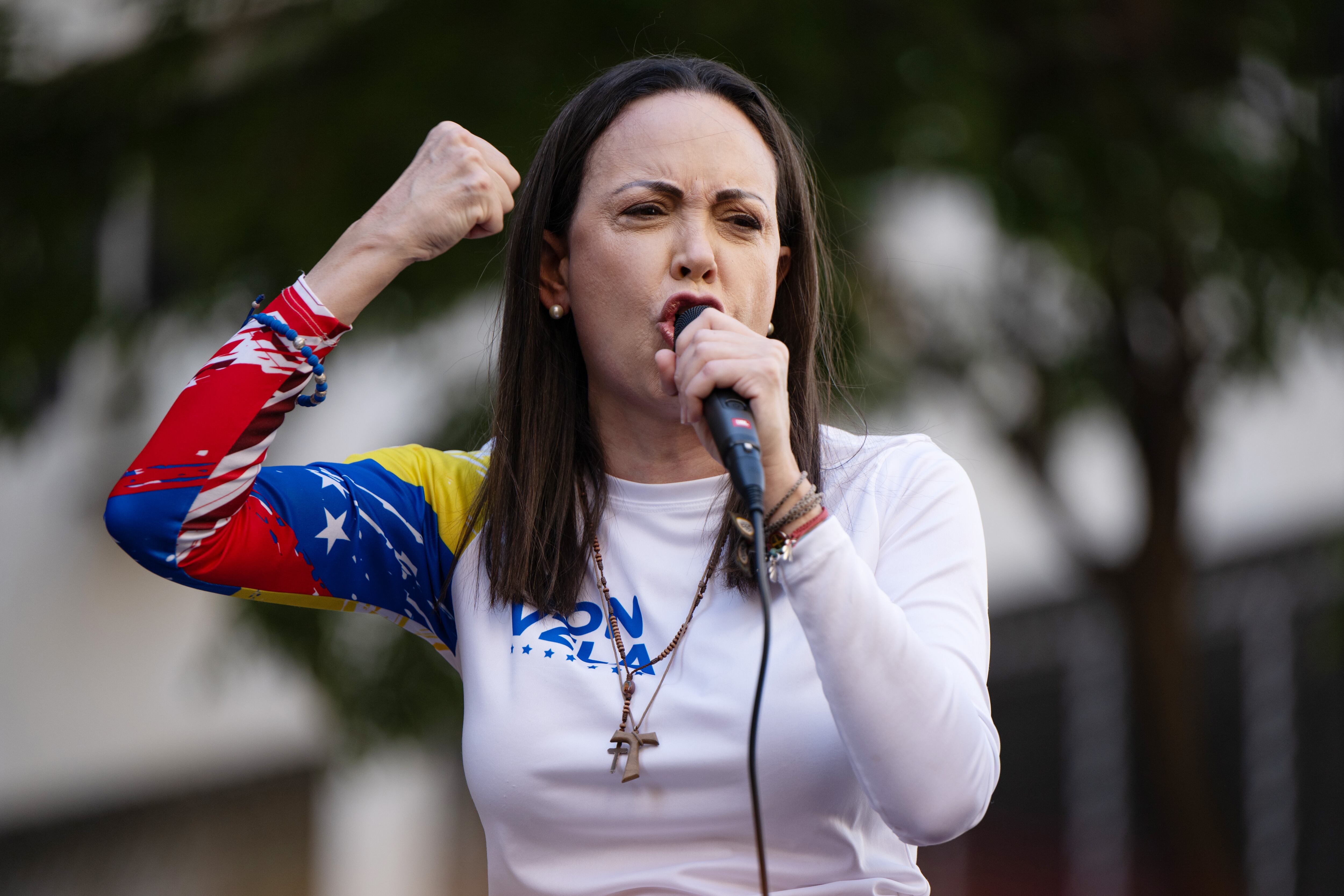 CARACAS, VENEZUELA - JANUARY 9: Opposition leader Maria Corina Machado gives a speech during an Anti-government protest on January 9, 2025 in Caracas, Venezuela. According to information shared by the Vente Venezuela Party, Machado was intercepted by government forces deployed by president Nicolas Maduro after finishing her participation in the rally. (Photo by Alfredo Lasry R/Getty Images)