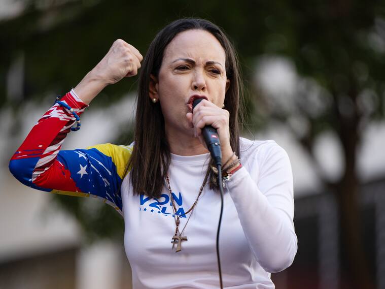 CARACAS, VENEZUELA - JANUARY 9: Opposition leader Maria Corina Machado gives a speech during an Anti-government protest on January 9, 2025 in Caracas, Venezuela. According to information shared by the Vente Venezuela Party, Machado was intercepted by government forces deployed by president Nicolas Maduro after finishing her participation in the rally. (Photo by Alfredo Lasry R/Getty Images)