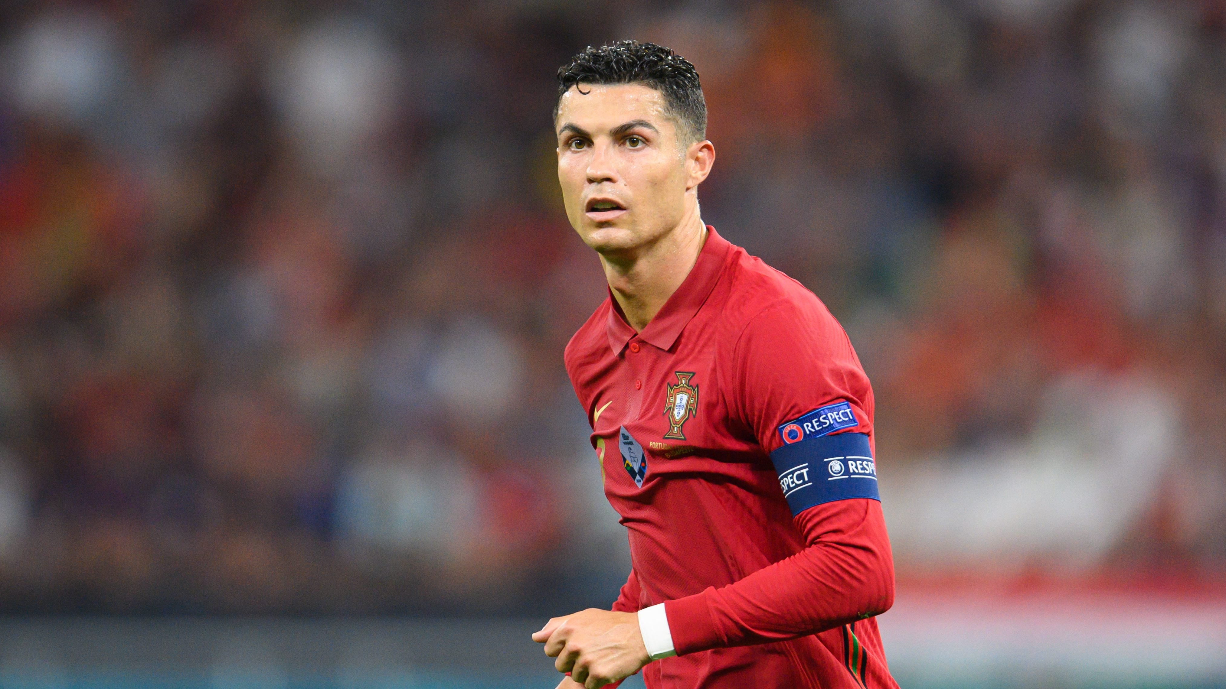 23 June 2021, Hungary, Budapest: Football: European Championship, Portugal - France, Preliminary round, Group F, Matchday 3, at Puskás Arena. Portugal's Cristiano Ronaldo is on the field. Photo: Robert Michael/dpa-Zentralbild/dpa - IMPORTANT NOTE: In accordance with the regulations of the DFL Deutsche Fußball Liga and/or the DFB Deutscher Fußball-Bund, it is prohibited to use or have used photographs taken in the stadium and/or of the match in the form of sequence pictures and/or video-like photo series. (Photo by Robert Michael/picture alliance via Getty Images)