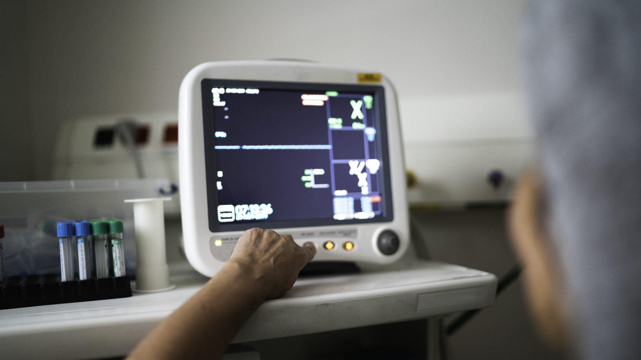 Doctor using equipment to exam a patient