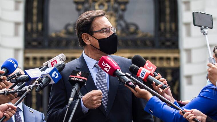 Former Peruvian President Martin Vizcarra speaks to the press after meeting a congressional commission to respond to bribery allegations, in Lima on December 1, 2020. - Congress impeached and dismissed Vizcarra over allegations he took kickbacks from developers when he was governor of the Moquegua region in 2014, charges he denies. (Photo by Ernesto BENAVIDES / AFP) (Photo by ERNESTO BENAVIDES/AFP via Getty Images)