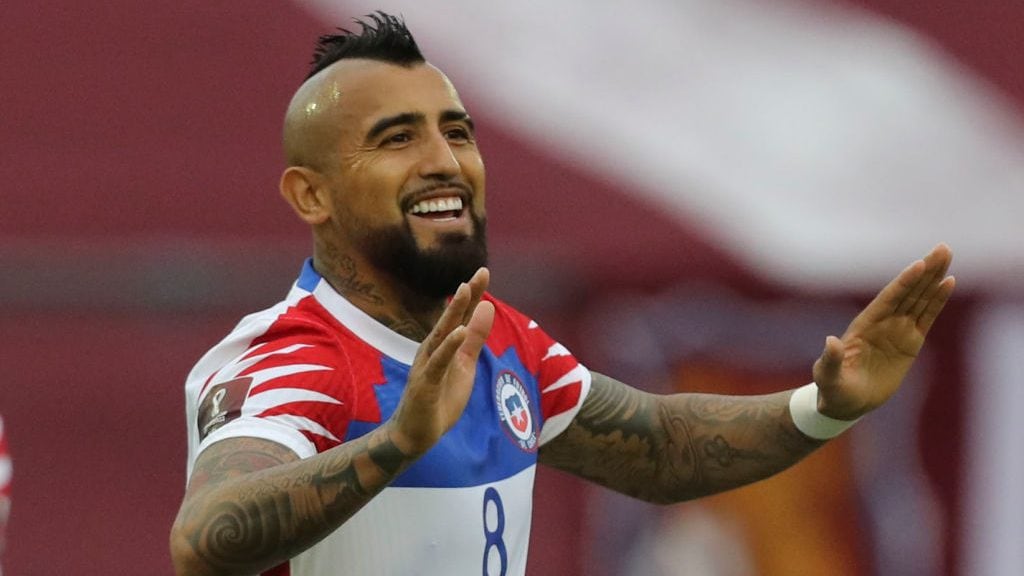 Chile's Arturo Vidal celebrates after scoring against Venezuela during their closed-door 2022 FIFA World Cup South American qualifier football match at the Olympic Stadium in Caracas on November 17, 2020. (Photo by Miguel GUTIERREZ / POOL / AFP) (Photo by MIGUEL GUTIERREZ/POOL/AFP via Getty Images)