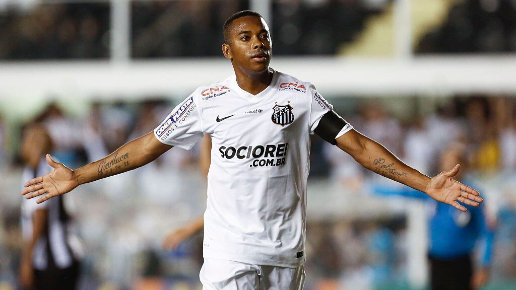 SAO PAULO, BRAZIL - SEPTEMBER 21: Robinho of Santos celebrates his goal scored during a match between Santos and Figueirense of Brasileirao Series A 2014 at Vila Belmiro Stadium on September 21, 2014 in Santos, Brazil. (Photo by Miguel Schincariol/Getty Images)