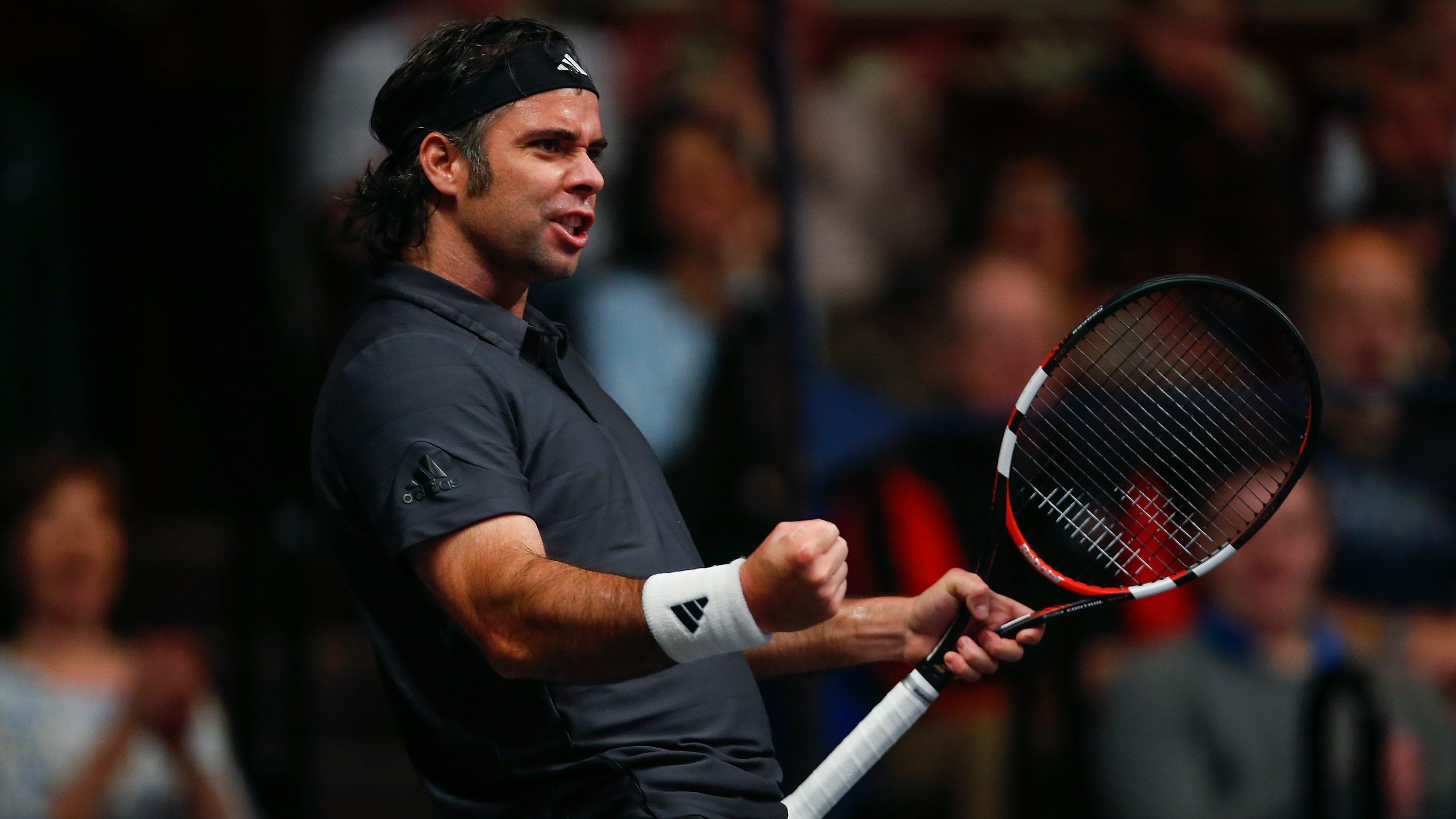 LONDON, ENGLAND - DECEMBER 06:  Fernando Gonzalez of Chile celebrates in the ATP Champions Tennis Final match against Tim Henman of Great Britain during day five of the Masters Tennis at the Royal Albert Hall on December 6, 2015 in London, England.  (Photo by Jordan Mansfield/Getty Images)