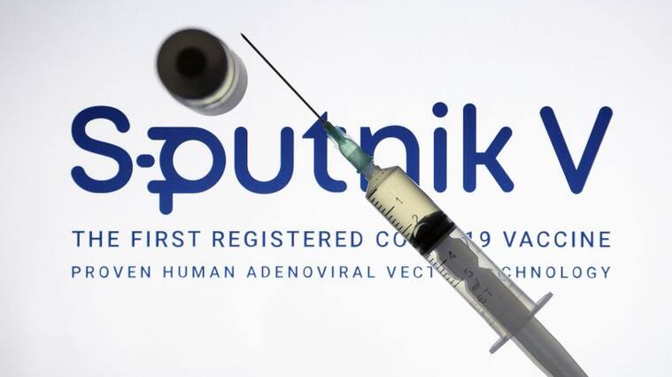 ANKARA, TURKEY - DECEMBER 24: In this photo illustration taken in Ankara, Turkey on December 24, 2020 Sputnik V, (Gam-COVID-Vac), COVID-19 vaccine logo is displayed on a screen with a syringe and a flacon in the front.. (Photo by Hakan Nural/Anadolu Agency via Getty Images)