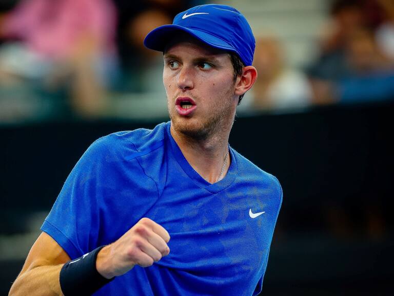 Nicolas Jarry of Chile reacts while playing against Dusan Lajovic of Serbia during their men's singles match on day six of the ATP Cup tennis tournament in Brisbane on January 8, 2020. (Photo by Patrick HAMILTON / AFP) / -- IMAGE RESTRICTED TO EDITORIAL USE - STRICTLY NO COMMERCIAL USE -- (Photo by PATRICK HAMILTON/AFP /AFP via Getty Images)