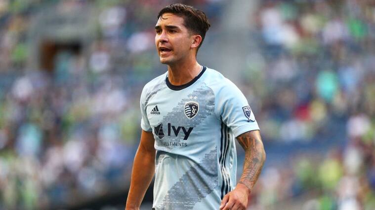 SEATTLE, WASHINGTON - AUGUST 04: Felipe Gutierrez #21 of Sporting Kansas City reacts against the Seattle Sounders in the first half during their game at CenturyLink Field on August 04, 2019 in Seattle, Washington. (Photo by Abbie Parr/Getty Images)