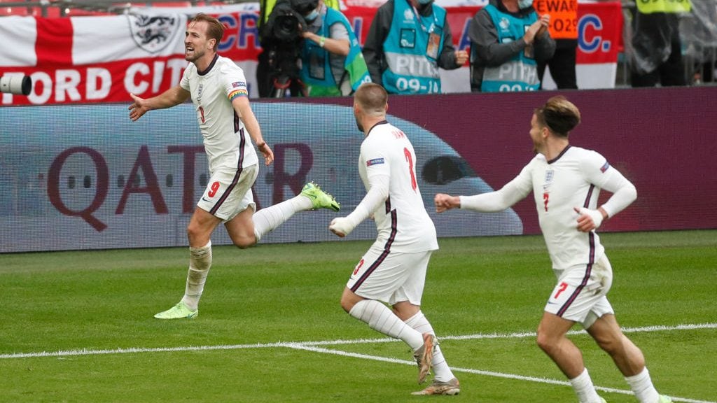 England's forward Harry Kane (L) celebrates after scoring the second goal during the UEFA EURO 2020 round of 16 football match between England and Germany at Wembley Stadium in London on June 29, 2021. (Photo by MATTHEW CHILDS / POOL / AFP) (Photo by MATTHEW CHILDS/POOL/AFP via Getty Images)