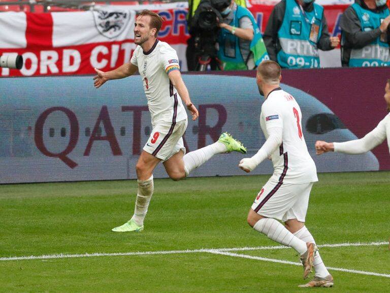 England's forward Harry Kane (L) celebrates after scoring the second goal during the UEFA EURO 2020 round of 16 football match between England and Germany at Wembley Stadium in London on June 29, 2021. (Photo by MATTHEW CHILDS / POOL / AFP) (Photo by MATTHEW CHILDS/POOL/AFP via Getty Images)