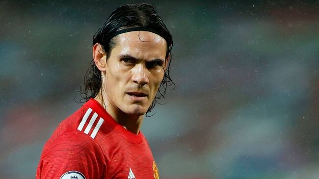 Manchester United's Uruguayan striker Edinson Cavani reacts during the English Premier League football match between Manchester United and Chelsea at Old Trafford in Manchester, north west England, on October 24, 2020. (Photo by PHIL NOBLE / POOL / AFP) / RESTRICTED TO EDITORIAL USE. No use with unauthorized audio, video, data, fixture lists, club/league logos or 'live' services. Online in-match use limited to 120 images. An additional 40 images may be used in extra time. No video emulation. Social media in-match use limited to 120 images. An additional 40 images may be used in extra time. No use in betting publications, games or single club/league/player publications. / (Photo by PHIL NOBLE/POOL/AFP via Getty Images)