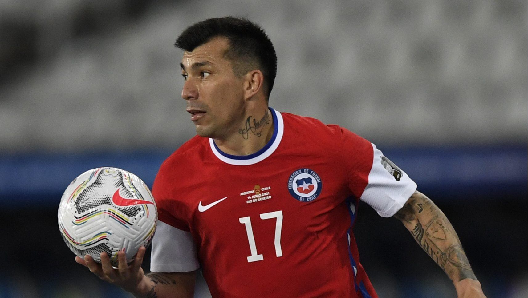Chile's Gary Medel holds the ball during the Conmebol Copa America 2021 football tournament group phase match against Argentina at the Nilton Santos Stadium in Rio de Janeiro, Brazil, on June 14, 2021. (Photo by MAURO PIMENTEL / AFP) (Photo by MAURO PIMENTEL/AFP via Getty Images)