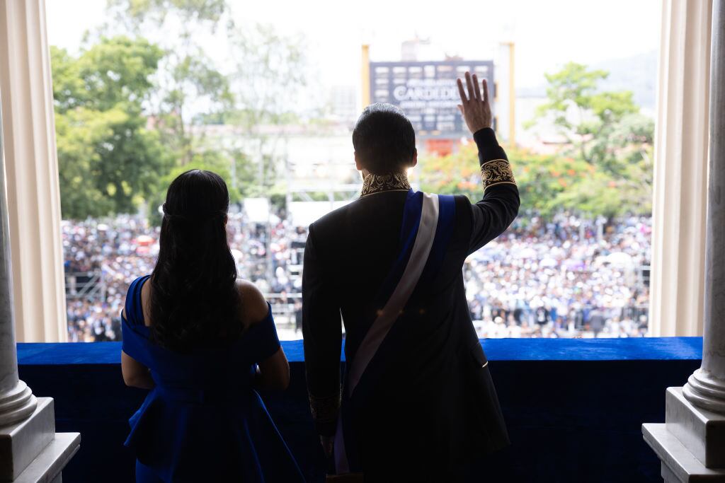 SAN SALVADOR, EL SALVADOR - JUNE 1: In this handout picture provided by the Salvadoran presidency, President of El Salvador Nayib Bukele, and First Lady of El Salvador Gabriela Rodríguez de Bukele waves to the public from the Palacio Nacional balcony during the 'Inauguration Day ' at Palacio Nacional on June 1, 2024 in San Salvador, El Salvador. Nayib Bukele won the presidential election on February 4 giving him a second consecutive term in office from 2024 to 2029. (Photo by Handout/Getty Images)