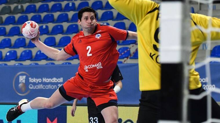 Chile's Caballos Sebastian shoots the ball during the IHF Men's Tokyo Handball Qualification 2020 match between Chile and Republic of Korea in Podgorica on March 12, 2021. (Photo by SAVO PRELEVIC / AFP) (Photo by SAVO PRELEVIC/AFP via Getty Images)