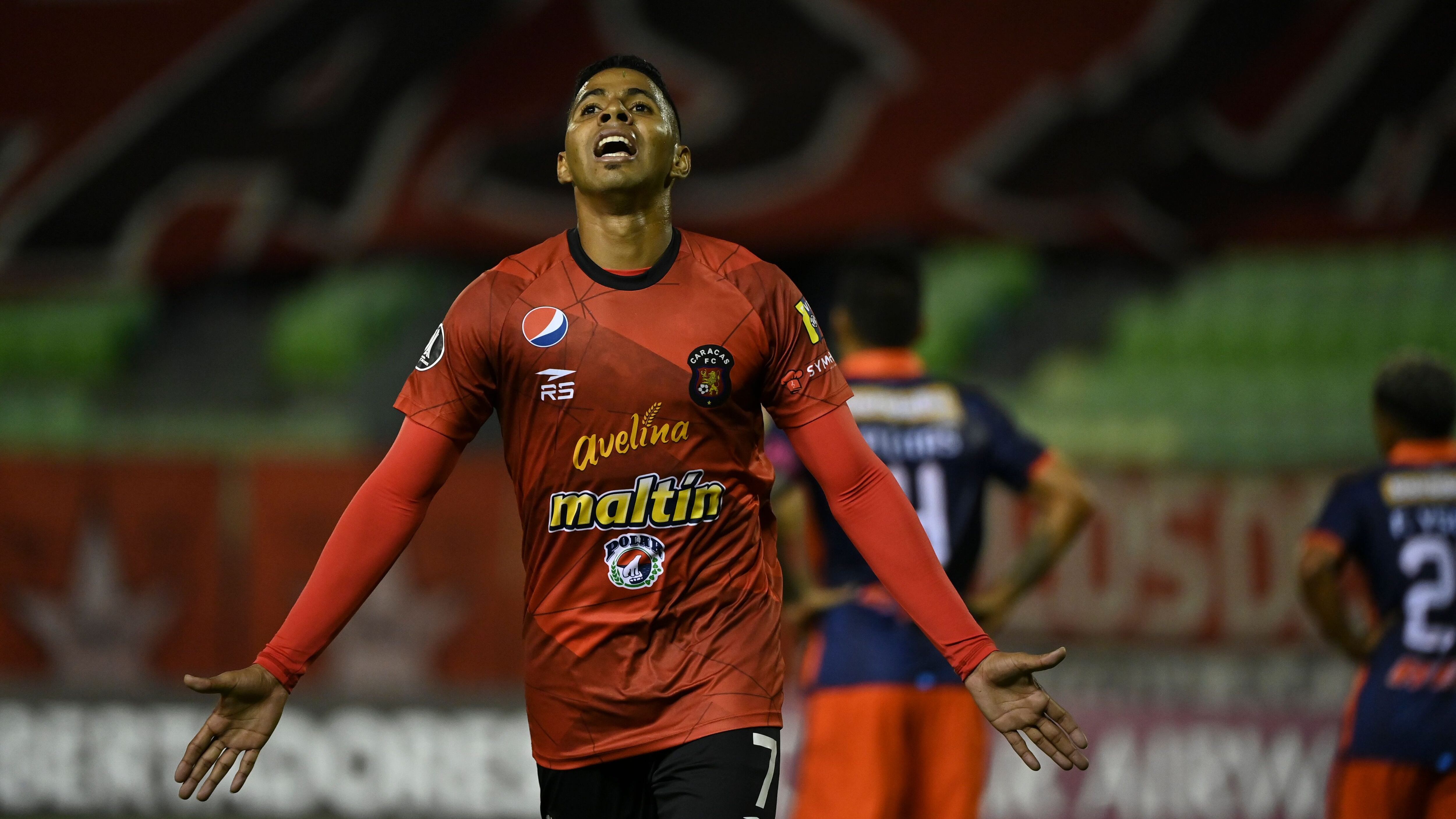 Venezuela's Caracas Richard Celis celebrates after scoring against Peru's Cesar Vallejo during their Copa Libertadores football match, at the UCV Olympic stadium, in Caracas, on March 3, 2021. (Photo by YURI CORTEZ / AFP) (Photo by YURI CORTEZ/AFP via Getty Images)