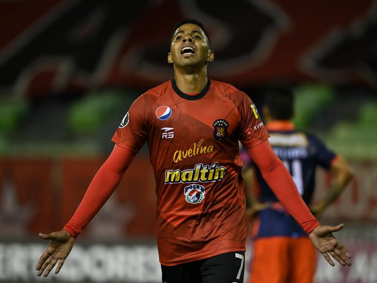 Venezuela&#039;s Caracas Richard Celis celebrates after scoring against Peru&#039;s Cesar Vallejo during their Copa Libertadores football match, at the UCV Olympic stadium, in Caracas, on March 3, 2021. (Photo by YURI CORTEZ / AFP) (Photo by YURI CORTEZ/AFP via Getty Images)