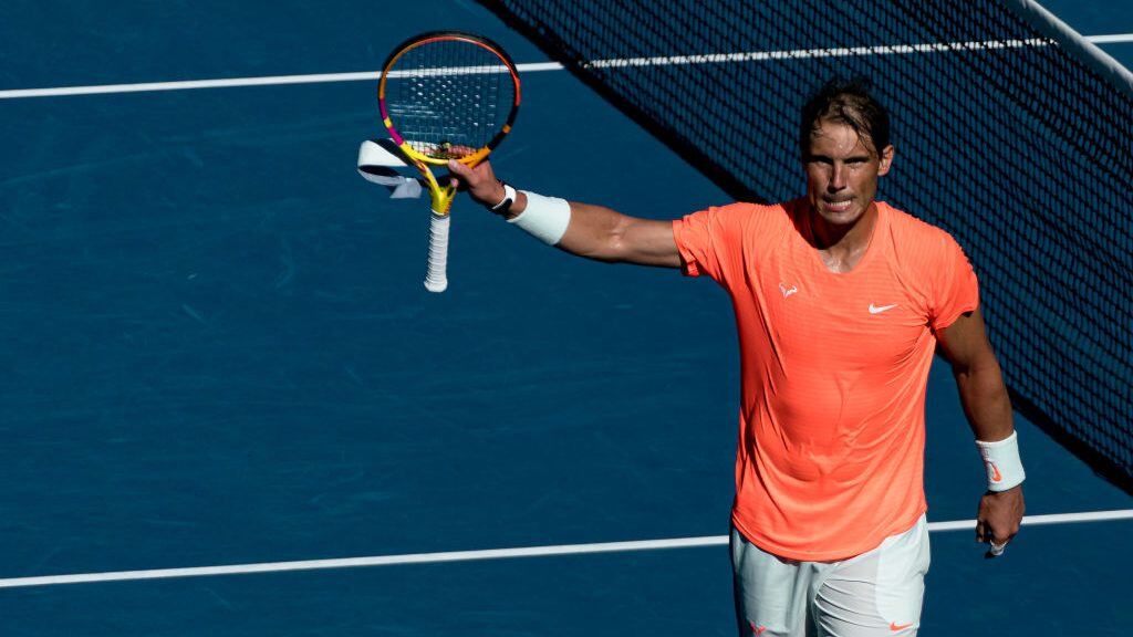MELBOURNE, AUSTRALIA - FEBRUARY 09: Rafael Nadal of Spain waves to the crowd in his Men's Singles first round match against Laslo Djere of Serbia during day two of the 2021 Australian Open at Melbourne Park on February 09, 2021 in Melbourne, Australia. (Photo by Andy Cheung/Getty Images)