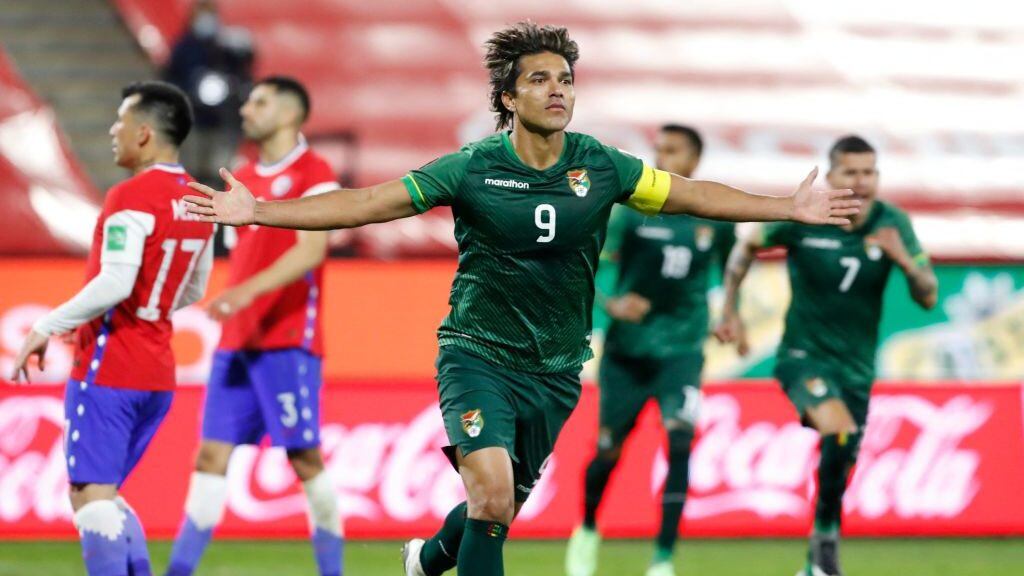 Bolivia's Marcelo Martins celebrates after scoring against Chile during their South American qualification football match for the FIFA World Cup Qatar 2022 at the National Stadium in Santiago on June 8, 2021. (Photo by Alberto Valdes / POOL / AFP) (Photo by ALBERTO VALDES/POOL/AFP via Getty Images)