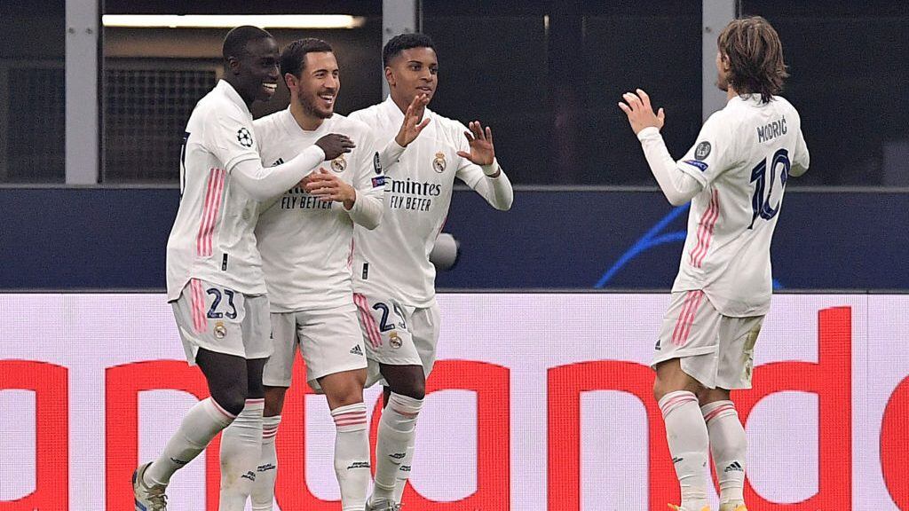 MILAN, ITALY - NOVEMBER 25: (L-R) Ferland Mendy of Real Madrid, Eden Hazard of Real Madrid, Rodrygo of Real Madrid, Luka Modric of Real Madrid Celebrating 0-2 during the UEFA Champions League match between Internazionale v Real Madrid at the San Siro on November 25, 2020 in Milan Italy (Photo by Mattia Ozbot/Soccrates/Getty Images)
