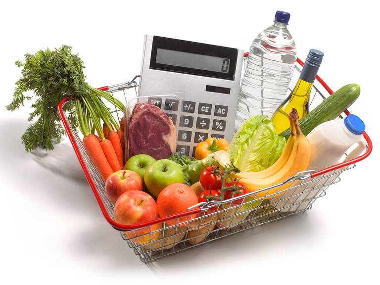 using calculator whilst shopping for healthy food, to keep within domestic budget